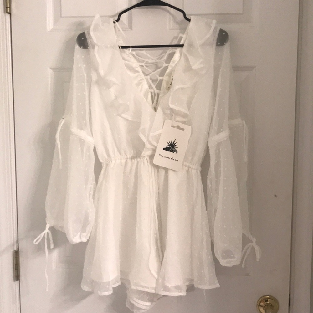 adorable white romper new with tags!